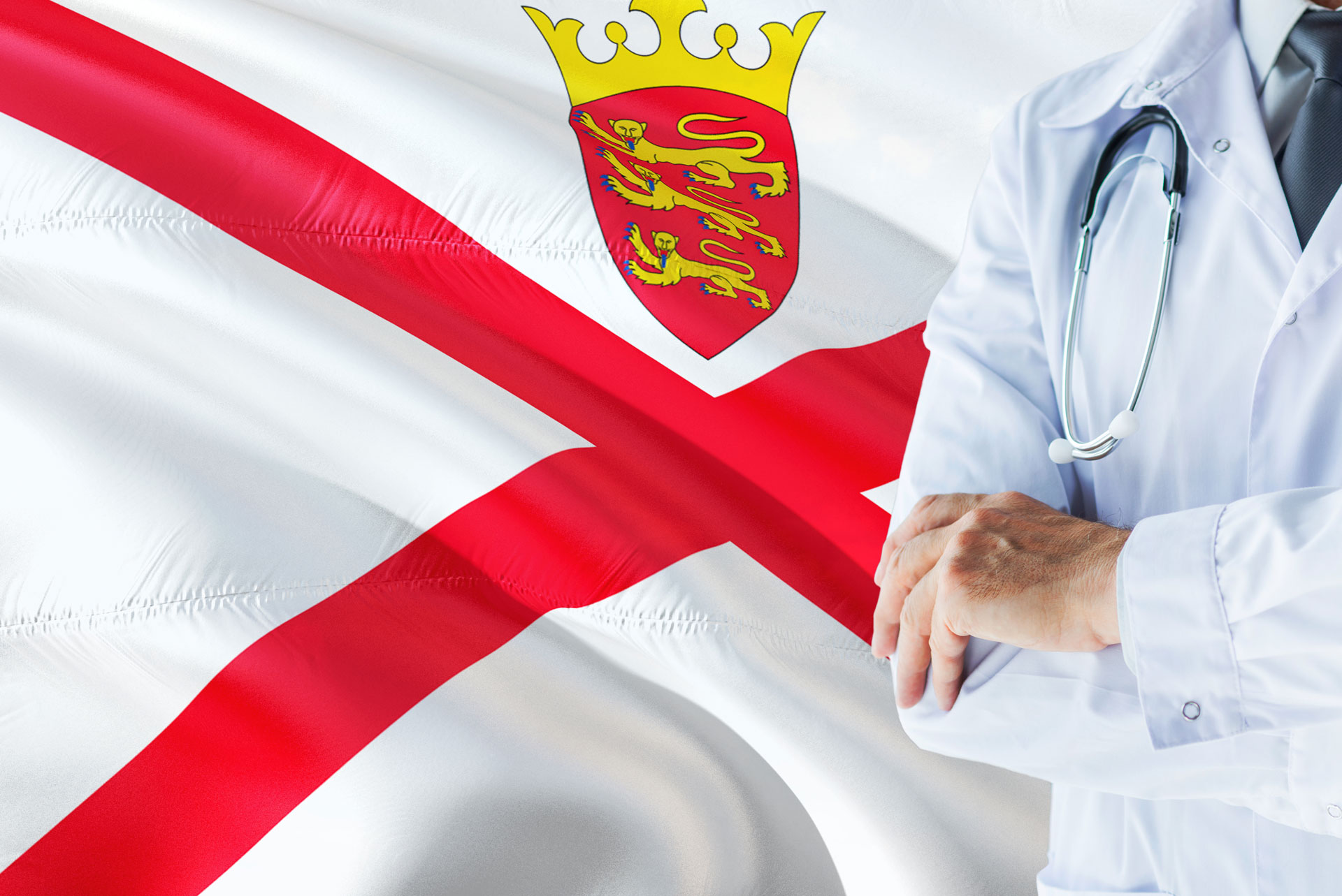 Doctor with stethoscope in front of Jersey flag