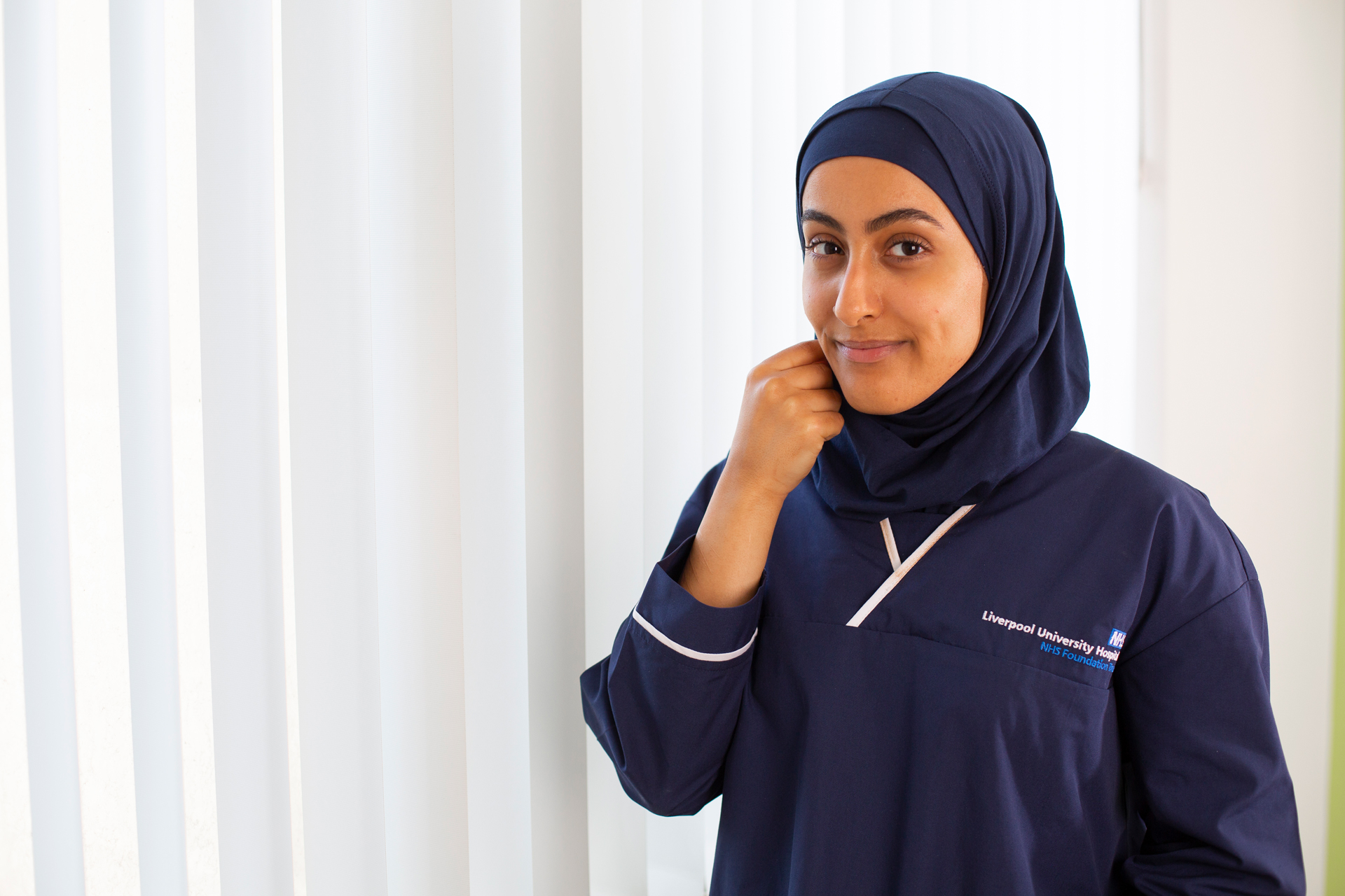 Nurse wearing head scarf