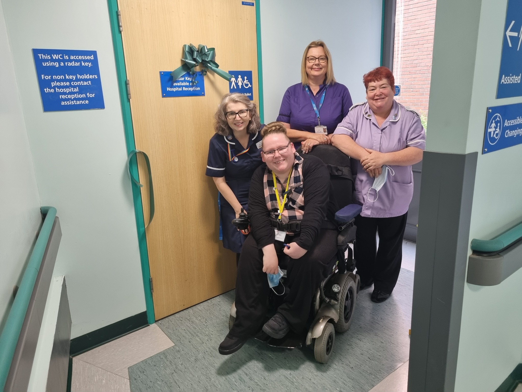 Wheelchair user and staff