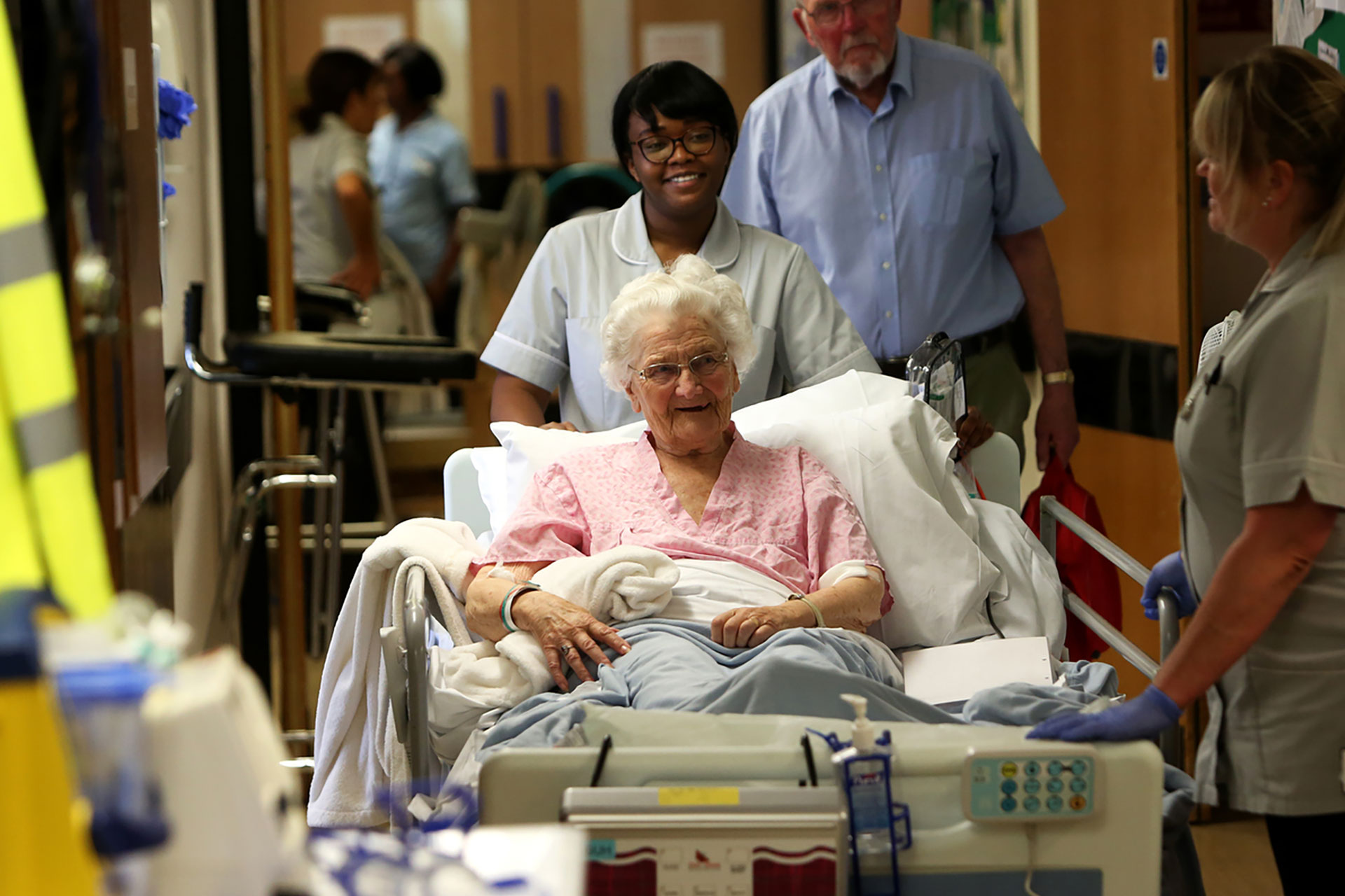 Elderly woman patient and porter