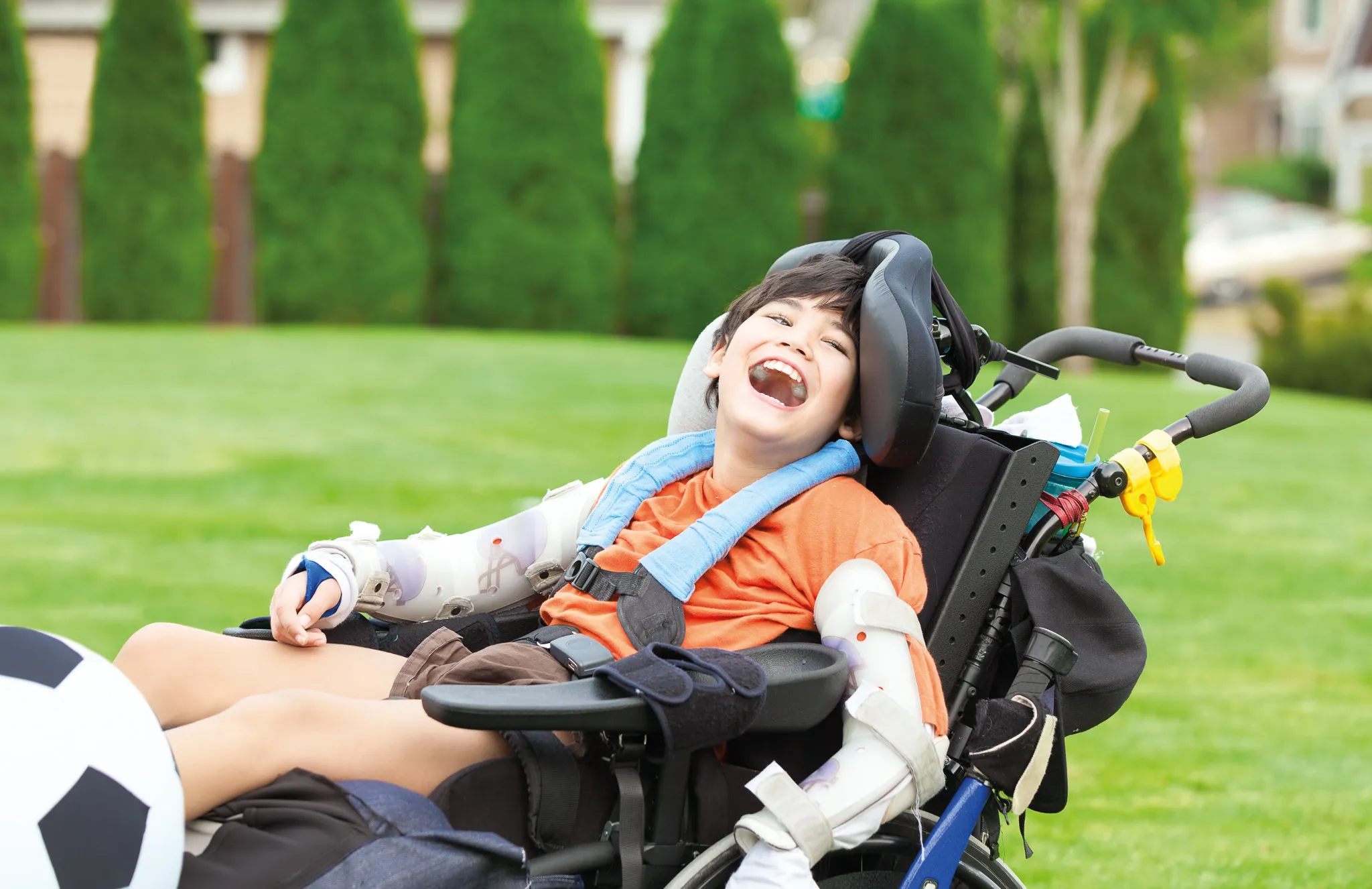 male-child-in-wheelchair-outside-Edit